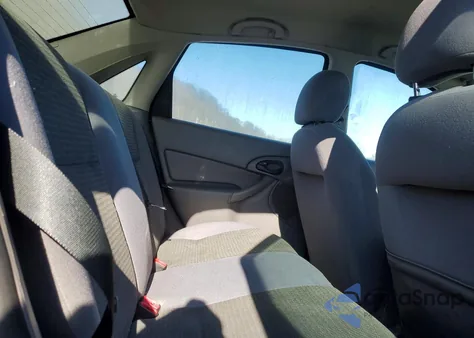 2004 Ford Focus Se Comfort z USA, uszkodzony, nr VIN 1FAFP34ZX4W143997